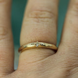arbutus band in 14k yellow gold with small diamond