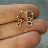 rubies set in solid 10k yellow gold on hand