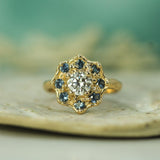 14k yellow gold ring with diamond and sapphires