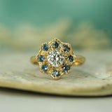 14k yellow gold ring with diamond and sapphires