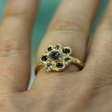 14k sapphire floral engagement ring on hand