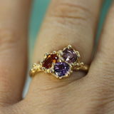 14k yellow gold cluster ring with sapphires on hand