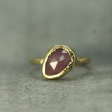 pink rosecut sapphire set in 10k yellow gold