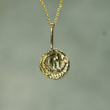 moon carved pendant in 10k yellow gold