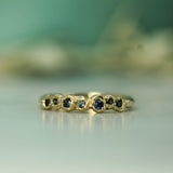 14k yellow gold with blue sapphires