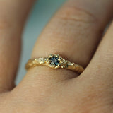 blue sapphire tide pool treasure ring on hand