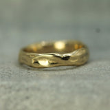 ocean inspired 14k yellow gold wedding band