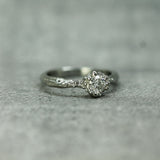 19k white gold mermaid treasure ring with diamond