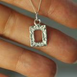 Holding Glimmers Pendant