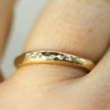 hammered gold band on hand