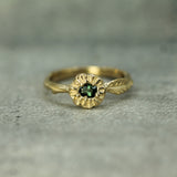 green sapphire leaf ring in 14k yellow gold