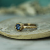 14k yellow gold bezel set sapphire ring