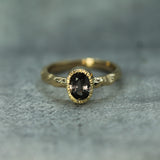 oval purple sapphire gold ring