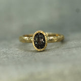 14k yellow gold bezel set purple sapphire ring