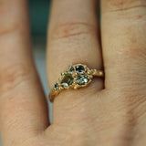 cluster sapphire ring on hand