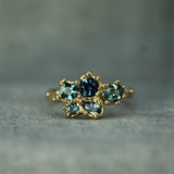 14k yellow gold blue tones of sapphires set in a cluster ring