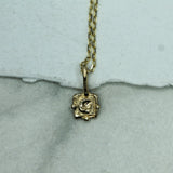 gold crescent moon pendant