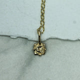 gold crescent moon pendant