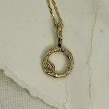 Swirling Sapphire Pendant
