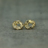 handcarved moonswirl gold earrings