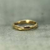 calm waters textured band in 14k yellow gold