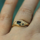 14k yellow gold with sapphire and raw sapphire on hand
