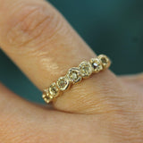 sage green sapphires set in yellow gold