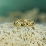 14 yellow gold teal sapphire band
