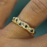 sapphire ocean inspired band on hand