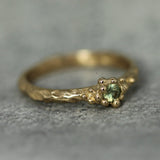ocean inspired engagement ring with textured golden bubbles
