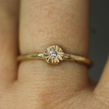 diamond little sun ring on hand