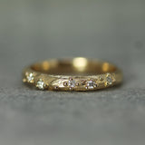 small diamonds set in oeany buubbles - solid yellow gold ring