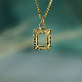 Holding Glimmers Pendant
