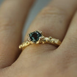14k yellow gold mermaid treasure ring with teal sapphire hand 