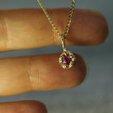 mermaid treasure pink sapphire pendant on hand 