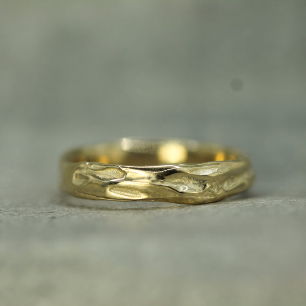 flowing tides band in 10k yellow gold 
