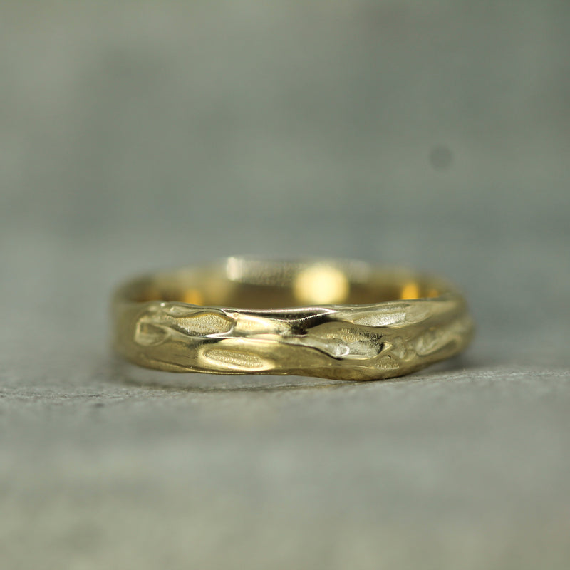 flowing tides band in 10k yellow gold 