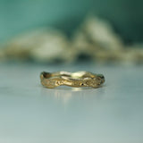 water inspired band in 14k yellow gold 