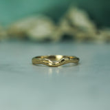 2mm wide flowing tides wave band in 14k yellow gold 