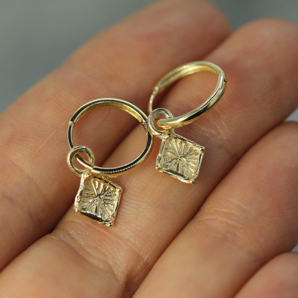 celestial 10k yellow gold sleeper charms on hand 