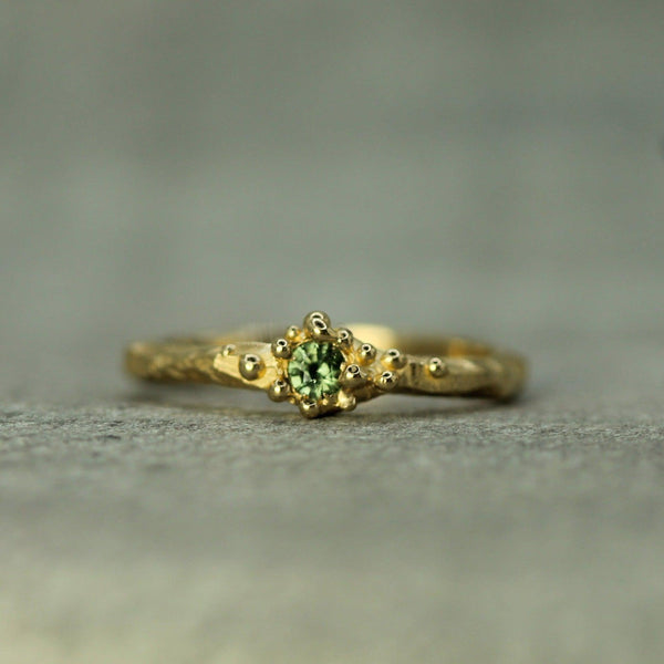 Tidal pool treasure ring with green sapphire 