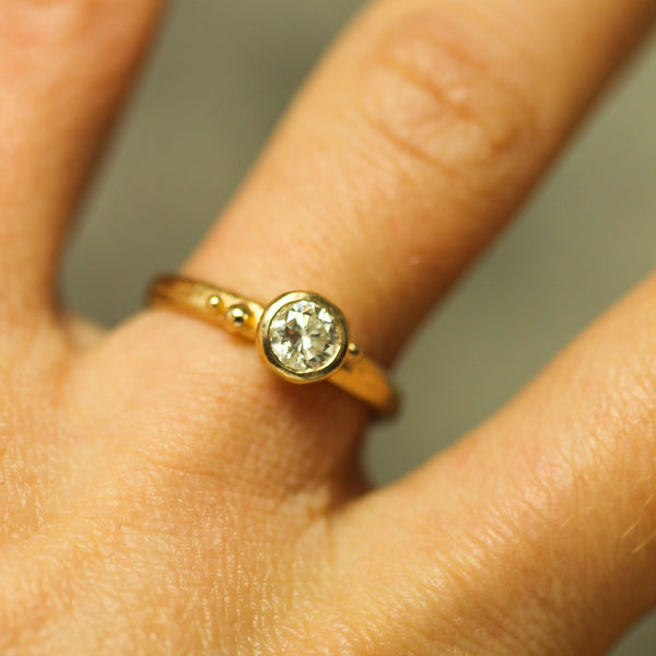 diamond coastal droplet ring on hand 