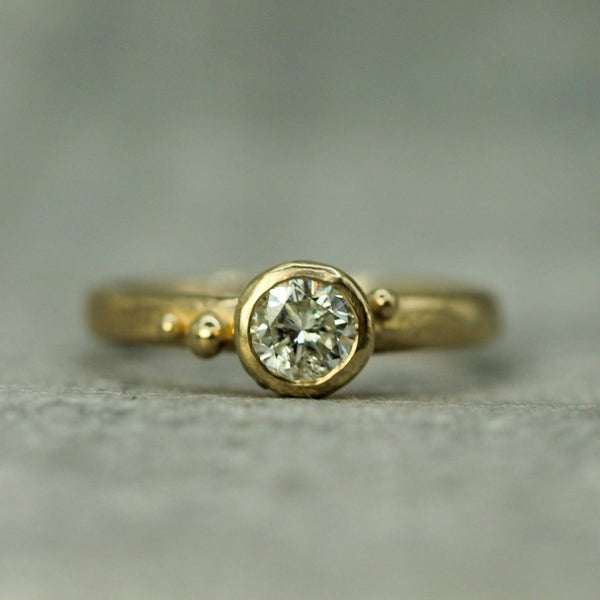 solitaire diamond engagement ring in 14k yellow gold 