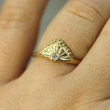 celestial peak diamond ring on hand 