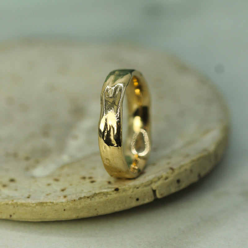 calm waters band in yellow gold 