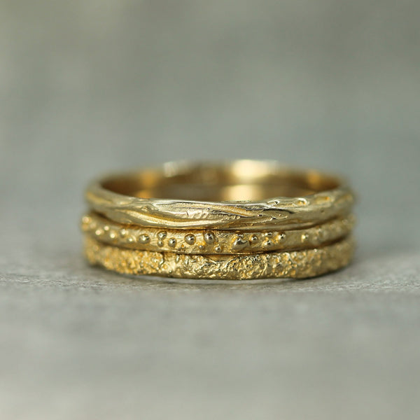 stacking textured gold rings 