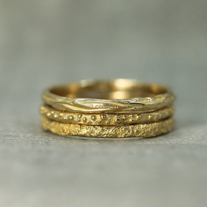 stacking textured gold rings 
