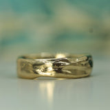 calm waters yellow gold wedding band 