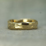 calm waters yellow gold wedding band 