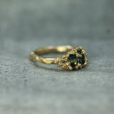 textured side view of the cluster sapphire ring 